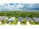 Attractive single-story home nestled among lush greenery in a serene neighborhood setting at 5927 Maidenstone Way, Palmetto, FL 34221