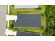 This aerial view highlights the roof, landscaping, and surrounding neighborhood of the property at 5927 Maidenstone Way, Palmetto, FL 34221
