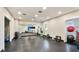 Open fitness area featuring exercise balls, weights, yoga mats, and a large mirror for training and wellness at 5927 Maidenstone Way, Palmetto, FL 34221