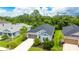 Desirable home with a two-car garage, a green lawn, and landscaping at 5927 Maidenstone Way, Palmetto, FL 34221