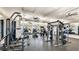 Well-lit gym with treadmills, stationary bikes, and weightlifting equipment for a comprehensive workout at 5927 Maidenstone Way, Palmetto, FL 34221