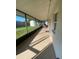 Relax on the screened-in porch with tile floor, offering views of the backyard at 6048 Merril St, North Port, FL 34287