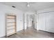 Inviting bedroom with a closet and a view into the hallway and into the kitchen at 6114 68Th E Dr, Palmetto, FL 34221