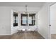 Bright breakfast nook features a charming bay window and modern lighting at 6114 68Th E Dr, Palmetto, FL 34221