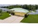 Spacious single-Gathering home with a well-maintained lawn and an oversized driveway at 6114 68Th E Dr, Palmetto, FL 34221