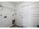 Utility room equipped with essential hookups and shelving at 6114 68Th E Dr, Palmetto, FL 34221