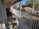 Serene screened patio with wicker chair and pleasant views at 6821 Fairview Ter # 6821, Bradenton, FL 34203