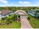 Beautiful aerial view of the property featuring a well-manicured lawn and inviting curb appeal at 6854 Chester Trl, Lakewood Ranch, FL 34202