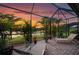 Enjoy stunning sunset views from this screened-in patio with brick flooring at 6854 Chester Trl, Lakewood Ranch, FL 34202