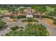 Expansive aerial view of the clubhouse, golf course and lakes at 6959 Westchester Cir, Bradenton, FL 34202