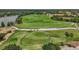 Expansive golf course with lush green fairways, scenic water features, and meticulously maintained greens at 6959 Westchester Cir, Bradenton, FL 34202