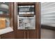 Gourmet kitchen boasts stainless steel appliances, including a microwave and built-in Thermador coffee machine at 6959 Westchester Cir, Bradenton, FL 34202