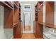 Spacious walk-in closet with built-in shelving and drawers, offering ample storage at 6959 Westchester Cir, Bradenton, FL 34202