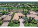 Beautiful home in an upscale golf community, featuring mature landscaping and a lake view at 7037 Brier Creek Ct, Lakewood Ranch, FL 34202