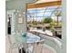 The breakfast nook features a view of the outdoor space and pool area at 7037 Brier Creek Ct, Lakewood Ranch, FL 34202