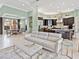 Open living space with a modern kitchen, dining area, and seating at 7037 Brier Creek Ct, Lakewood Ranch, FL 34202