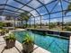 A beautiful screened-in pool area with spa provides plenty of space for outdoor enjoyment at 7037 Brier Creek Ct, Lakewood Ranch, FL 34202