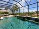Enjoy outdoor living with this lovely screened-in pool area, complete with spa and lounge area at 7037 Brier Creek Ct, Lakewood Ranch, FL 34202