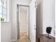 A modern elevator in a condo with white walls and a tile floor at 7387 Divot Loop # 15-D, Lakewood Ranch, FL 34202