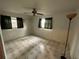 Bedroom with tiled floors and natural light at 7555 15Th N St, St Petersburg, FL 33702