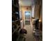 This laundry area features a utility sink, washer and dryer, and cabinet storage at 853 Albritton Ave, Sarasota, FL 34232