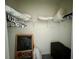 Walk-in closet with additional storage space at 8995 Milestone Dr, Sarasota, FL 34238