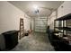 Clean and functional two-car garage with ample storage space and an automatic door opener at 8995 Milestone Dr, Sarasota, FL 34238
