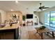 Open-concept living area adjacent to the kitchen offering comfortable space at 8995 Milestone Dr, Sarasota, FL 34238
