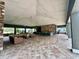 Community outdoor area with seating, bar and grill area at 8995 Milestone Dr, Sarasota, FL 34238