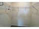 Walk-in closet with ample storage space with sturdy metal racks to store your belongings at 8995 Milestone Dr, Sarasota, FL 34238