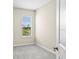 Bedroom with neutral-toned walls, carpet, and natural light from the window at 9292 Tequila Sunrise Dr, Sarasota, FL 34241