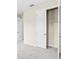 Neutral bedroom featuring carpet and a closet with an opened door at 9292 Tequila Sunrise Dr, Sarasota, FL 34241