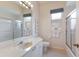 Clean bathroom with a large mirror, marble vanity, and a shower-tub combination at 10022 Laurel Valley Avenue Cir, Bradenton, FL 34202