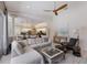 Open concept living area boasts ample seating and views of the kitchen at 10022 Laurel Valley Avenue Cir, Bradenton, FL 34202