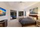 Comfortable main bedroom with vaulted ceiling and pool view, plus a private outdoor lounge area at 10022 Laurel Valley Avenue Cir, Bradenton, FL 34202