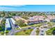 Wide angle aerial view of the complex displaying covered parking and beautiful grounds at 10037 62Nd N Ter # 23, St Petersburg, FL 33708