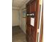 Arts and crafts room entrance with warm wood door and visible flooring at 10037 62Nd N Ter # 23, St Petersburg, FL 33708