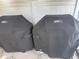 Two weber grills with covers sitting on the patio ready to be used at 10037 62Nd N Ter # 23, St Petersburg, FL 33708