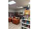 Cozy library featuring bookshelves, comfortable seating and ample reading material at 10037 62Nd N Ter # 23, St Petersburg, FL 33708