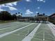 Community shuffleboard courts with seating perfect for an active outdoor lifestyle at 10037 62Nd N Ter # 23, St Petersburg, FL 33708