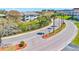 Picturesque street view with lush landscaping, palm trees, and well-maintained grounds at 10037 62Nd N Ter # 23, St Petersburg, FL 33708