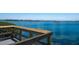 Scenic water view with boats docked, seen from a wooden deck area at 1004 68Th Nw St, Bradenton, FL 34209
