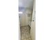 This cozy bathroom features a single sink vanity and tile flooring at 10315 Cortez W Rd # 24-2, Bradenton, FL 34210