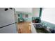 Open kitchen and living area providing ample space and seamlessly connects to the relaxing living room at 10315 Cortez W Rd # 24-2, Bradenton, FL 34210