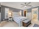 Main bedroom features neutral colors, an ensuite bathroom, and a walk in closet at 1071 Owl Dr, Englewood, FL 34223