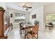 Inviting dining room with tile flooring and classic furniture at 11009 Wildcat Dr, Riverview, FL 33579