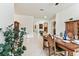 Formal dining room with tile flooring, neutral colors, and ample space for entertaining at 11009 Wildcat Dr, Riverview, FL 33579