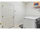 Practical laundry area with a modern washer and dryer and ample storage space at 11009 Wildcat Dr, Riverview, FL 33579