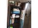 Relaxing bathroom with shelving unit displaying neatly folded towels at 1209 Croydonwood Cir, Brandon, FL 33510