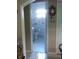 Bright bathroom with a toilet and vanity sink is seen from the doorway at 1209 Croydonwood Cir, Brandon, FL 33510